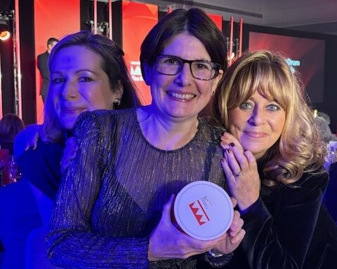 Sarah-Jane Howitt, with Dawn Paine celebrating